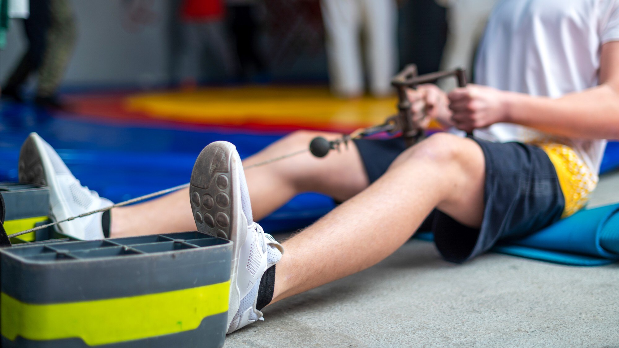 Athlete doing conditioning exercise in gym